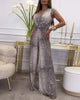 Sleeveless Printed Jumpsuit with Twist Deep V-Neck