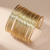 Gold Spiral Open Bracelet