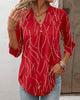 Elegant V-Neck Top with Button Print