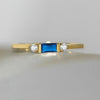 Gold Ring with a Dazzling Blue Centre Stone